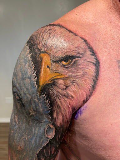 Explore lesbian couple tattoo ideas, creative tattoo ideas in Elko, available at Freedom Tattoo