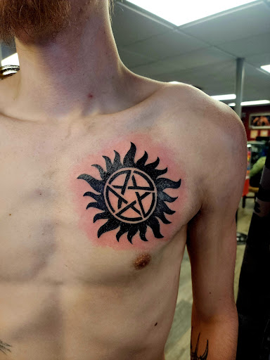 Explore finger tattoo ideas words, creative tattoo ideas in West Bend, available at Frenchys Tattoos & Co LLC