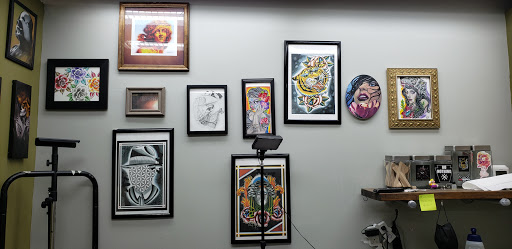 Tattoo Shop «3 Layers Deep Piercing & Tattoo Gallery», reviews and photos, 4651 N State Rd 7 #12c, Coral Springs, FL 33073, USA