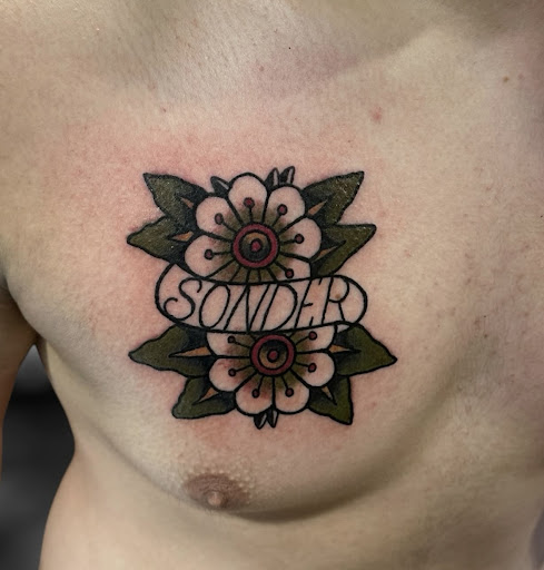 Explore evolution tattoo ideas, creative tattoo ideas in Marietta, available at The Queen Bee Tattoo and Piercing Parlour