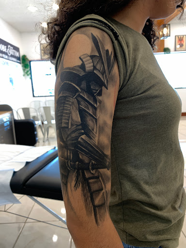Explore fox and the hound tattoo ideas, creative tattoo ideas in Twentynine Palms, available at Adobe Tattoo
