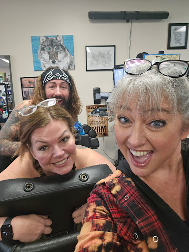 Explore female dragon tattoo ideas, creative tattoo ideas in Traverse City, available at Pinups & Needles