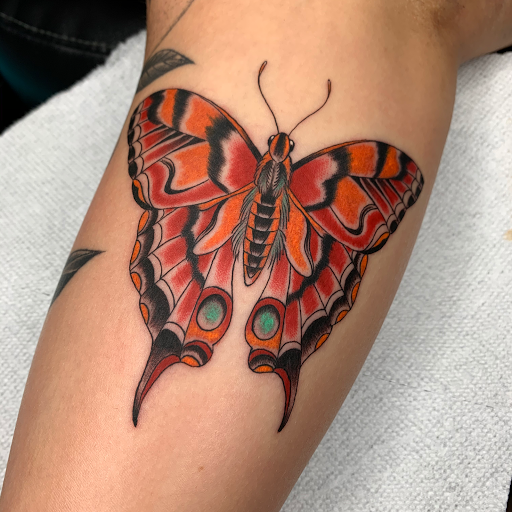 Explore small tribal tattoo ideas, creative tattoo ideas in Edgewood, available at Wild Coyote Tattoo