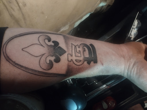 Explore knee tattoo ideas for men, creative tattoo ideas in Park Hills, available at Body Designs Tattoo & Piercing