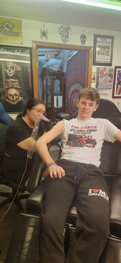 Explore tattoo 3/4 sleeve ideas, creative tattoo ideas in Vermillion, available at IKTOMI-INK Tattoo Experience