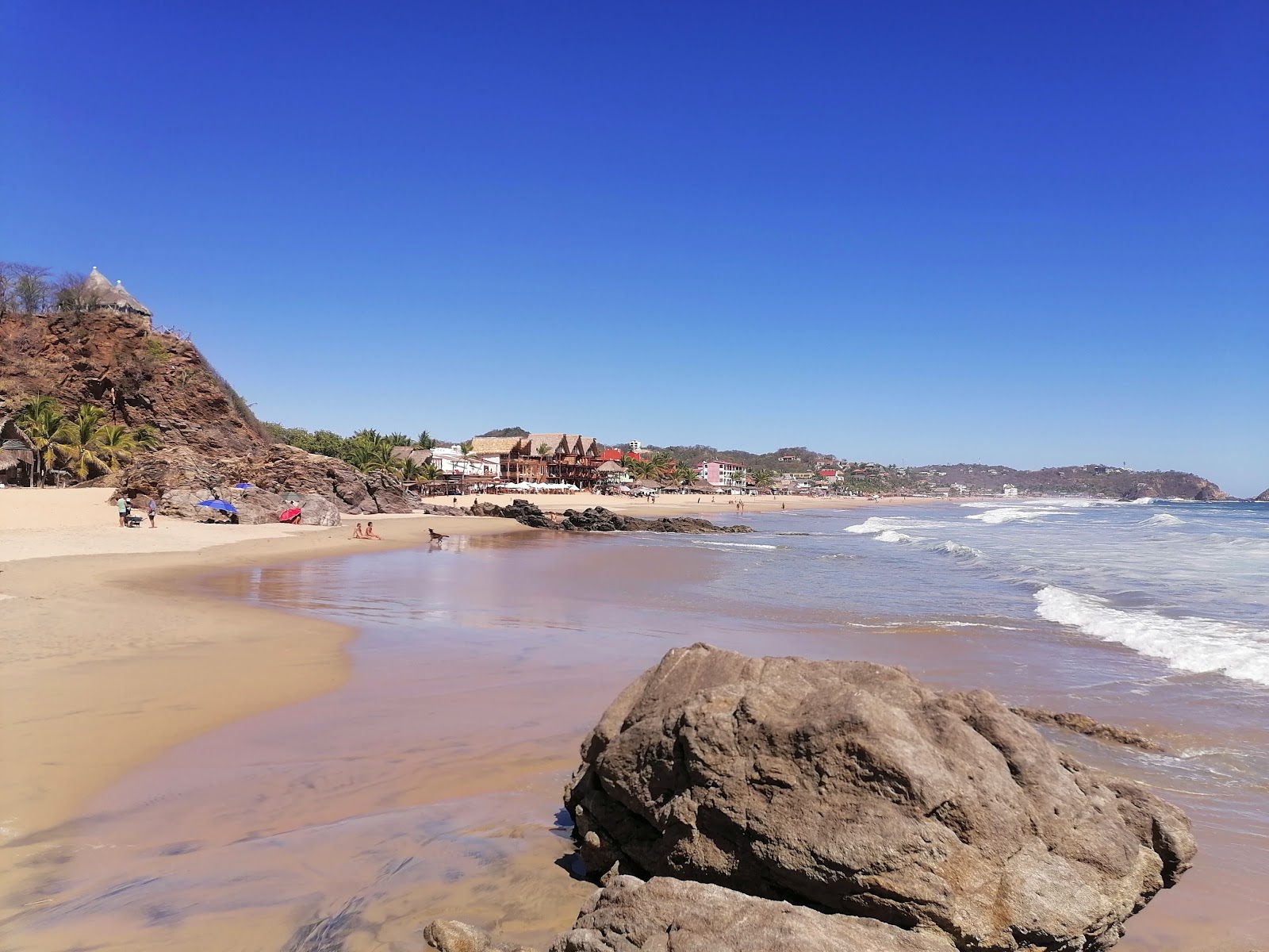 Photo of Playa Zipolite with long straight shore