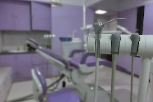 Lakshmi Roots Dental Hospital- Dr Suganesh BEST DENTIST VILLIVAKKAM image
