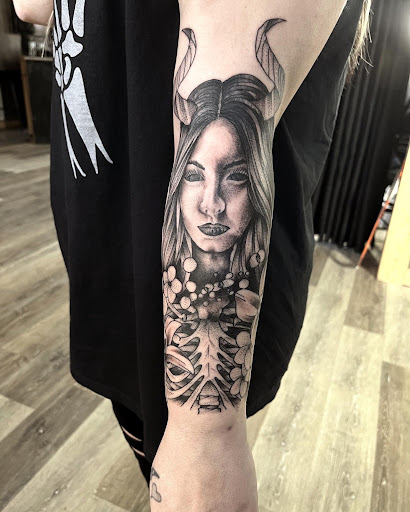 Explore women's tattoo sleeve ideas, creative tattoo ideas in Gadsden, available at Sacred Art Tattoo Company