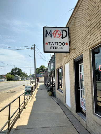 Explore purple tattoo ideas, creative tattoo ideas in Peoria, available at Mad Tattoo and Piercing