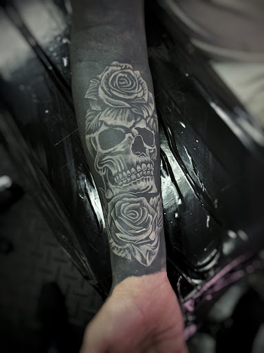 Explore small behind ear tattoo ideas, creative tattoo ideas in Fort Myers, available at Loyal 2 The Coil Tattoos & Piercings (Edison Mall Location Entrance F)