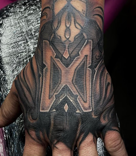 Explore rosary tattoo ideas, creative tattoo ideas in Clarksville, available at Dark Raine Tattoo