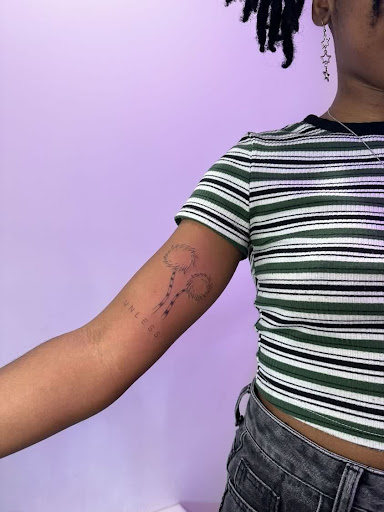 Explore cover up lower back tattoo ideas, creative tattoo ideas in Chicago, available at Crispy Aura Fine Line Tattoos