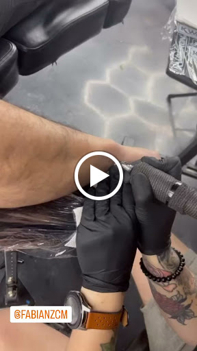 Explore nail technician tattoo ideas, creative tattoo ideas in Hollywood, available at Sacred Eye Tattoos