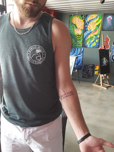 Explore cover up tattoo ideas for shoulder, creative tattoo ideas in Myrtle Beach, available at Elite Ink Tattoos of Myrtle Beach