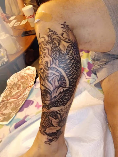 Explore grease tattoo ideas, creative tattoo ideas in Navasota, available at Big Mikes Tattoos