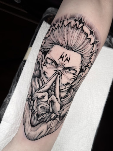 Explore flower tattoo ideas on arm, creative tattoo ideas in Johnson City, available at Gold Cross Tattoo Co.