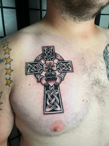 Explore female lion tattoo ideas, creative tattoo ideas in Arlington, available at Benchmark Tattoos