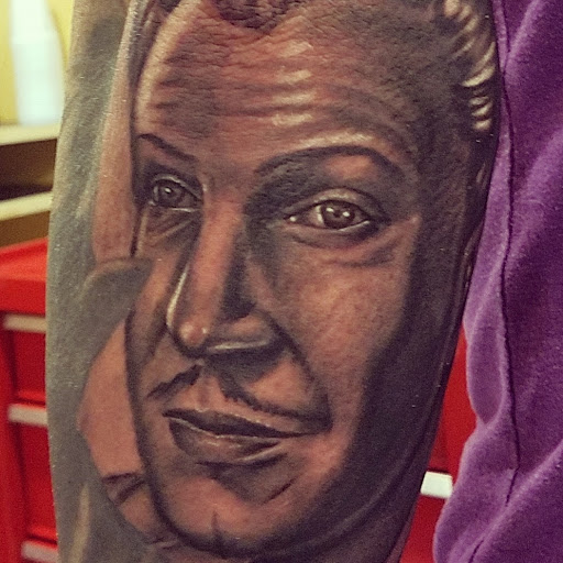 Explore tattoo flag ideas, creative tattoo ideas in Amherst, available at Wanderlust Tattoo & Piercing