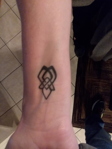 Explore mandalorian tattoo ideas, creative tattoo ideas in Vista, available at Vista Body Art