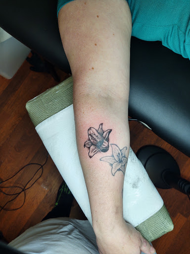 Explore tattoo ideas in french, creative tattoo ideas in Saint Helens, available at Real Eye Zing Art
