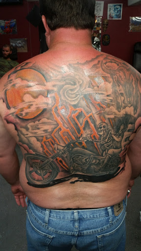 Explore tattoo flag ideas, creative tattoo ideas in Beaumont, available at Spirit House Studios