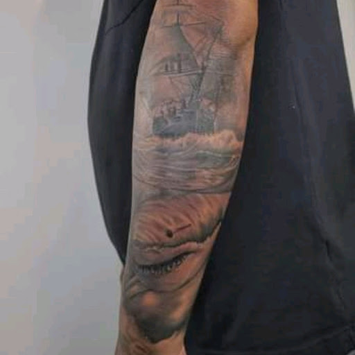 Explore ocean wave tattoo ideas, creative tattoo ideas in Chicago, available at Mind Crusher Tattoo