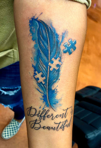 Explore olive tattoo ideas, creative tattoo ideas in Aledo, available at Elevated Tattoo & Piercing