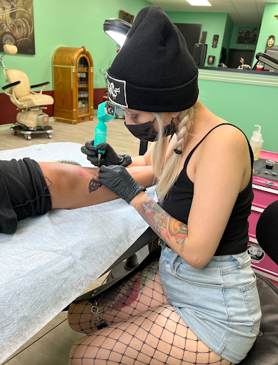 Explore tattoo ideas doves, creative tattoo ideas in Upland, available at Greaskull Tattoo Alley