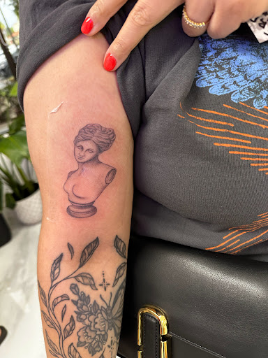 Find simple sun tattoo ideas for your next unique tattoo in Delray Beach at Imaginarium ink