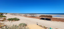 Perlubie Beach'in fotoğrafı uçurumlarla desteklenmiş