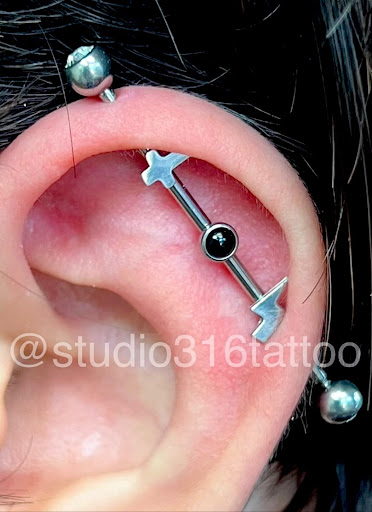 Explore charlie brown tattoo ideas, creative tattoo ideas in Jackson Heights, available at studio 316 Tattoo & Body Piercing