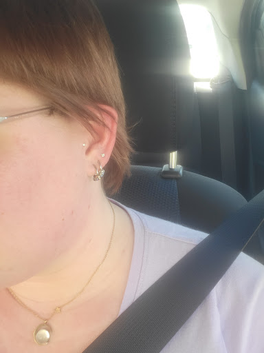 Explore cover up tattoo ideas for lower back, creative tattoo ideas in San Diego, available at Sideshow Tattoo and Piercing