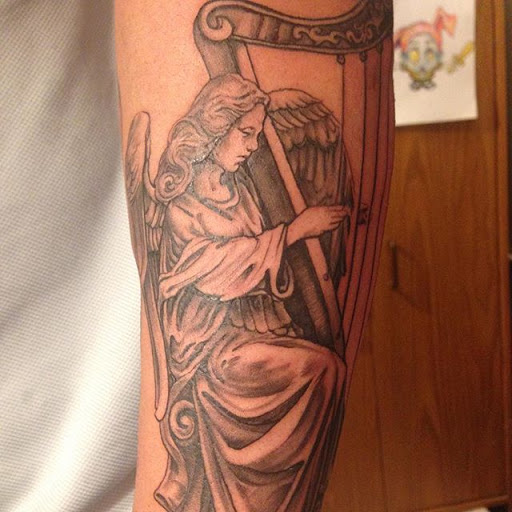 Tattoo Shop «Tattoo Cafe», reviews and photos, 2141 Broadview Rd, Cleveland, OH 44109, USA