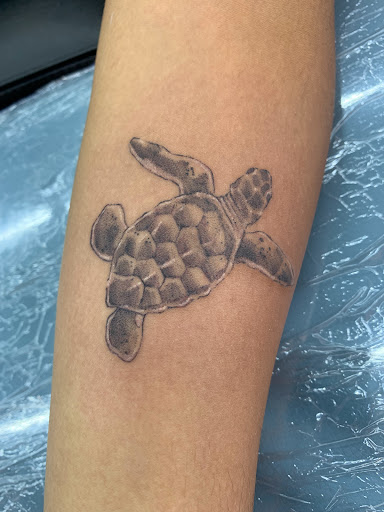 Explore chest sleeve tattoo ideas, creative tattoo ideas in Beaufort, available at Kiss of Ink Tattoo