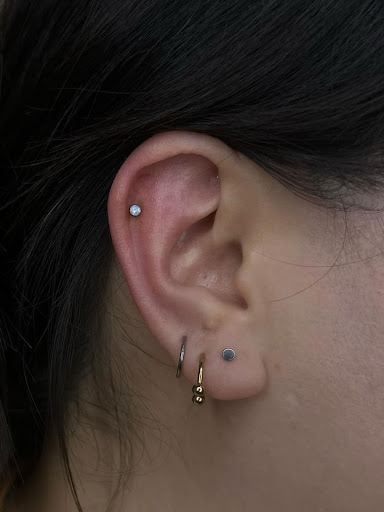 Explore lower belly tattoo ideas, creative tattoo ideas in Oak Park, available at Ageless Arts Tattoo and Body Piercing