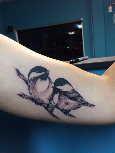 Explore belle tattoo ideas, creative tattoo ideas in Nampa, available at Temptation Tattoo & Body Piercing