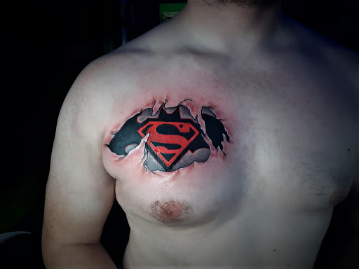 Explore smiley face tattoo ideas, creative tattoo ideas in Arlington, available at The Chosen One Ink