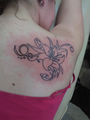 Explore toothless tattoo ideas, creative tattoo ideas in Cadillac, available at Perfect Tattoos & Body Piercings