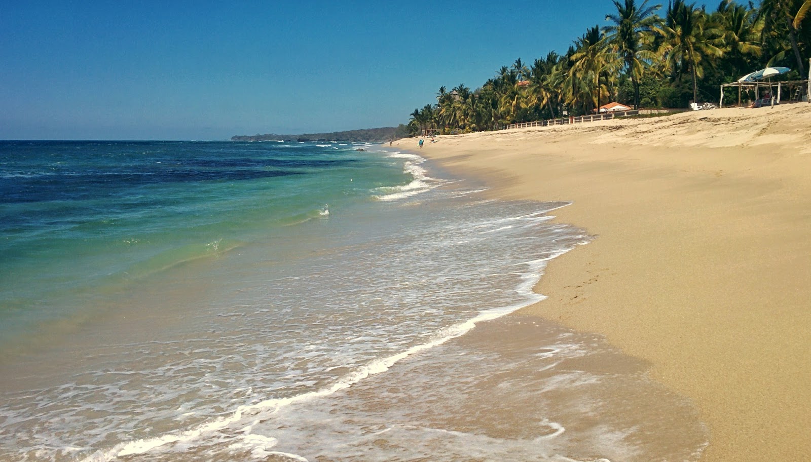 Fotografija Burro Punta Mita z svetel pesek površino