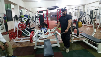 Bhatti Gym - 2nd Floor، Hafeez Plaza, Sargodha Rd, Ideal Town, Faisalabad, Punjab 38000, Pakistan
