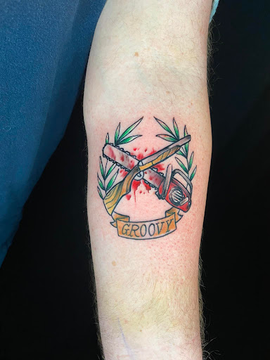 Find time clock tattoo ideas for your next unique tattoo in Arlington at Urbans Tattoo & Piercing Studio