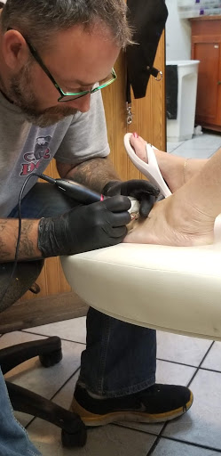 Explore lily tattoo ideas, creative tattoo ideas in Johnstown, available at Screaming Needle Tattoo & Body Piercing