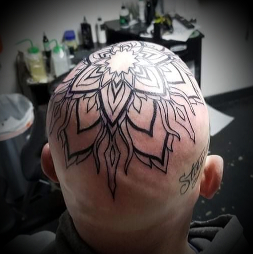 Explore korn tattoo ideas, creative tattoo ideas in Nevada, available at Generation X Tattoos and Piercings