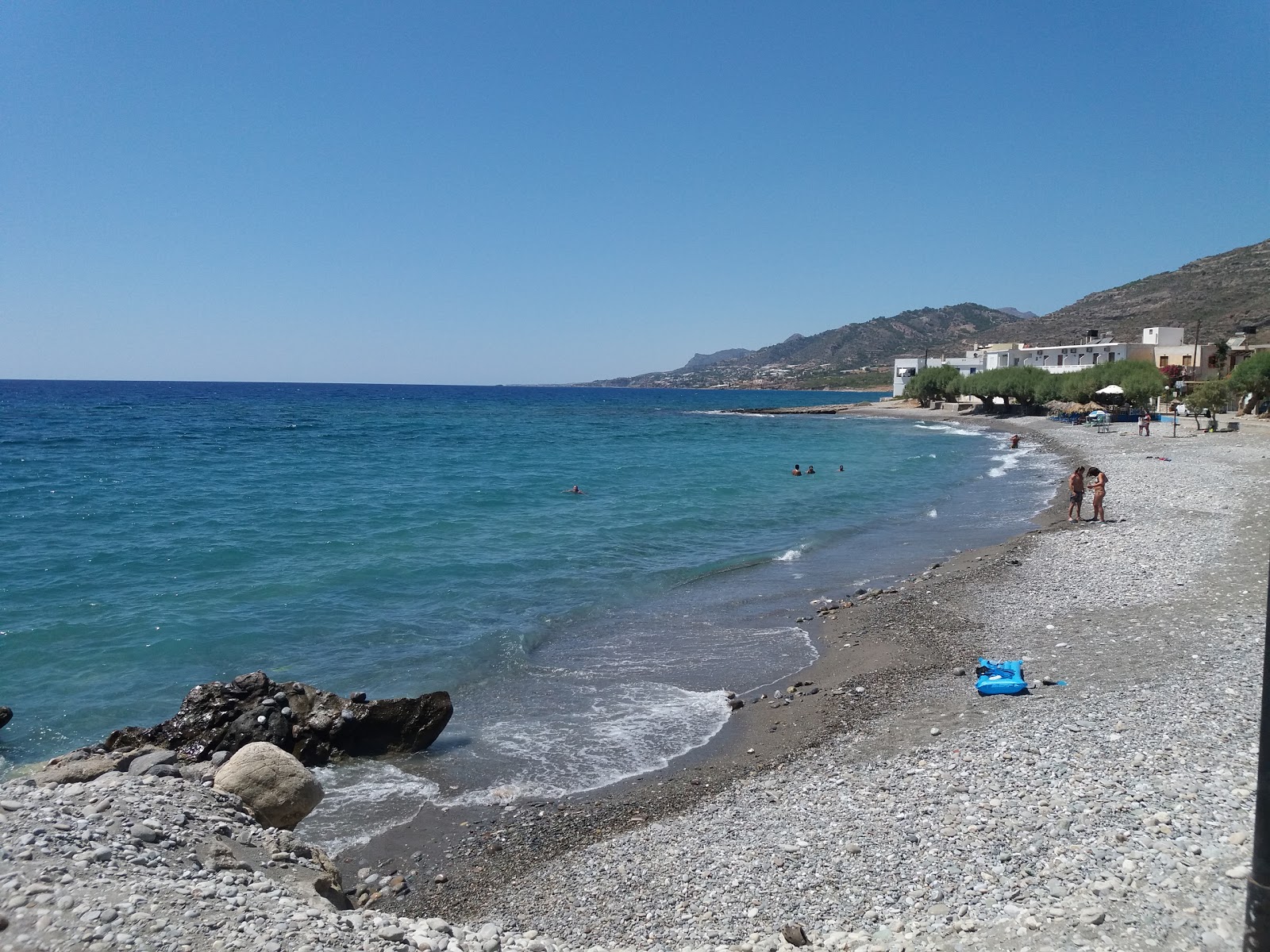Foto von Koutsouri beach mit grauer sand & kiesel Oberfläche