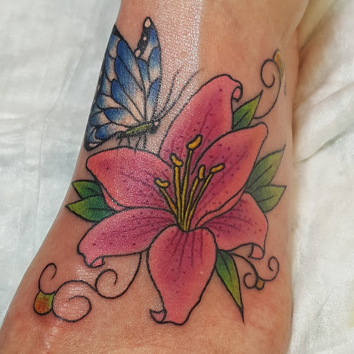 Explore rose cover up tattoo ideas, creative tattoo ideas in Modesto, available at Inkwell Tattoo