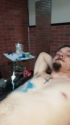 Tattoo Shop «Attitudes Muskegon», reviews and photos, 1610 Evanston Ave, Muskegon, MI 49442, USA