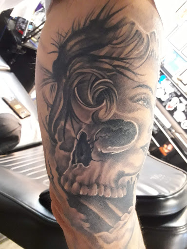 Explore throat tattoo ideas for men, creative tattoo ideas in Cocoa Beach, available at The Corner Tattoo and Piercing Studio