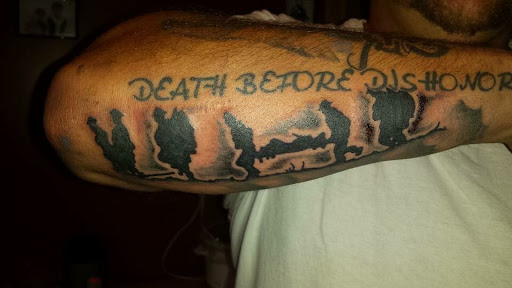 Find tattoo ideas black for your next unique tattoo in Cape Coral at UNRIVALED INK