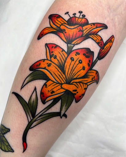 Explore tattoo ideas for women flower, creative tattoo ideas in Lakeland, available at Black Swan Tattoo