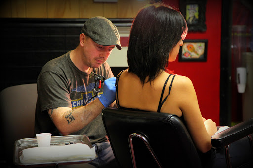 Explore metamorphosis tattoo ideas, creative tattoo ideas in Ann Arbor, available at Lucky Monkey Tattoo Parlour